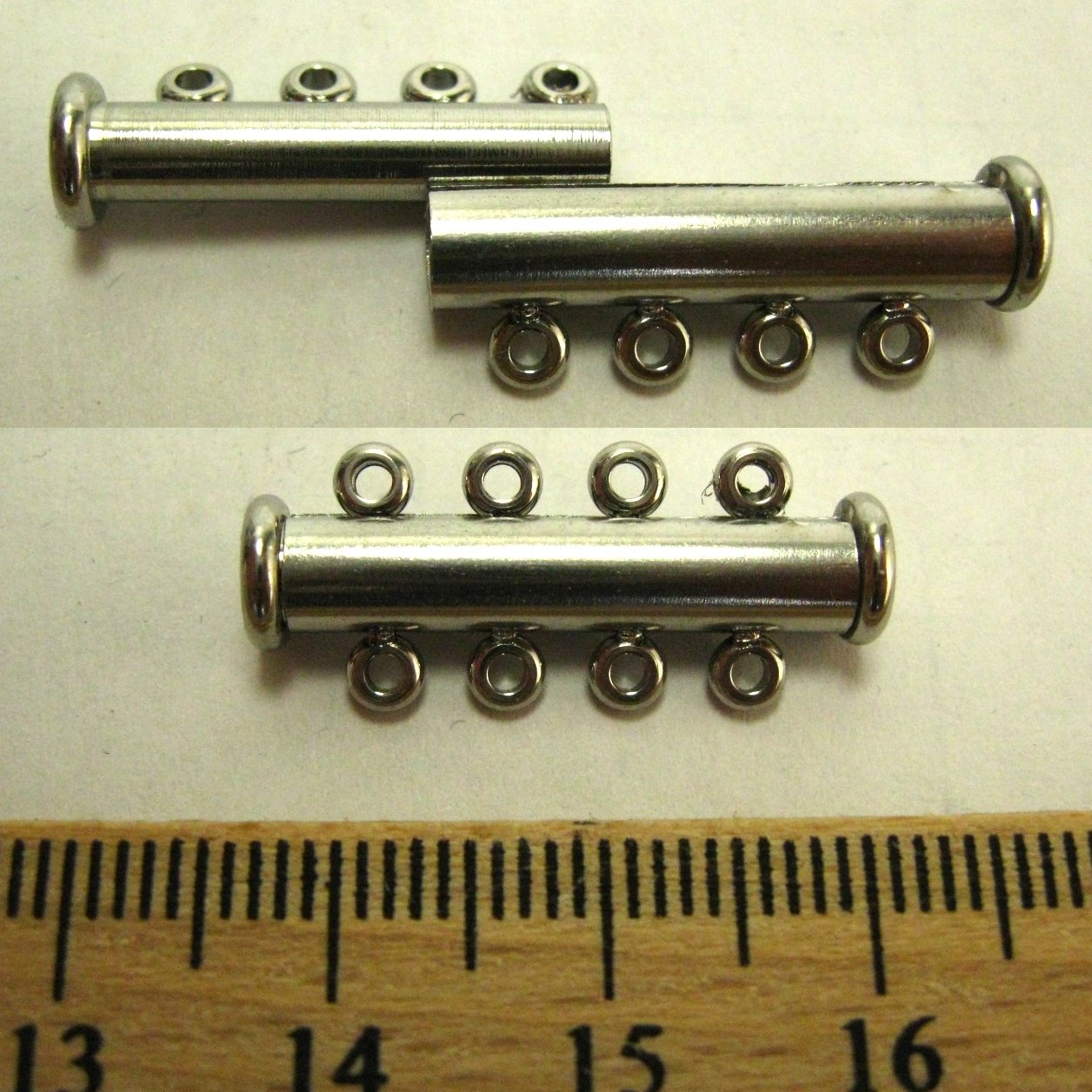 Schuifsluiting vier rijen, RVS. Met magneet